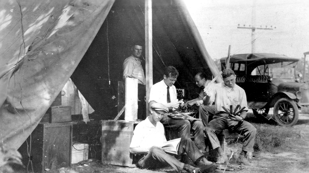 Men working in a tent