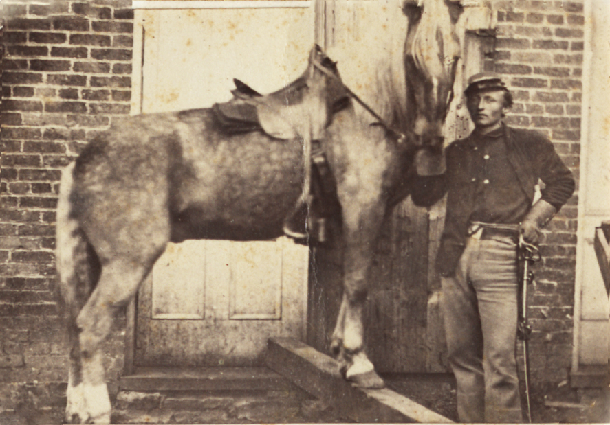Richard Wende in uniform with horse