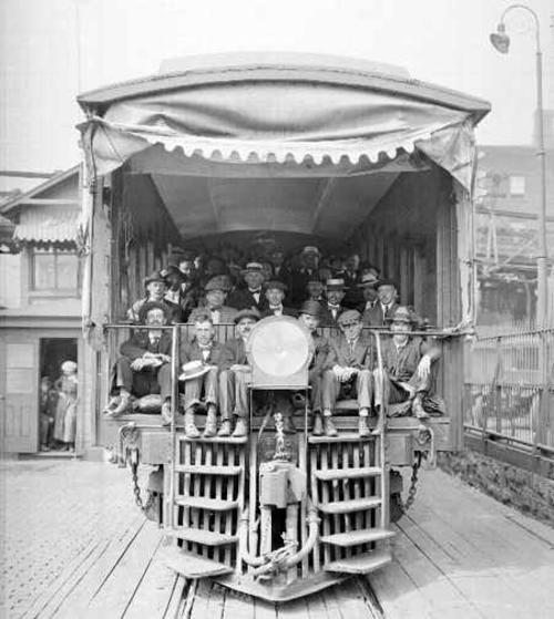 Railroad employees on traincar