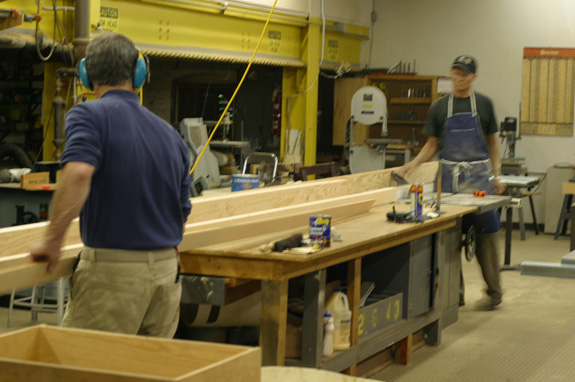Carpenters Mike Crawford and Steve McGovern help with the boxcar project