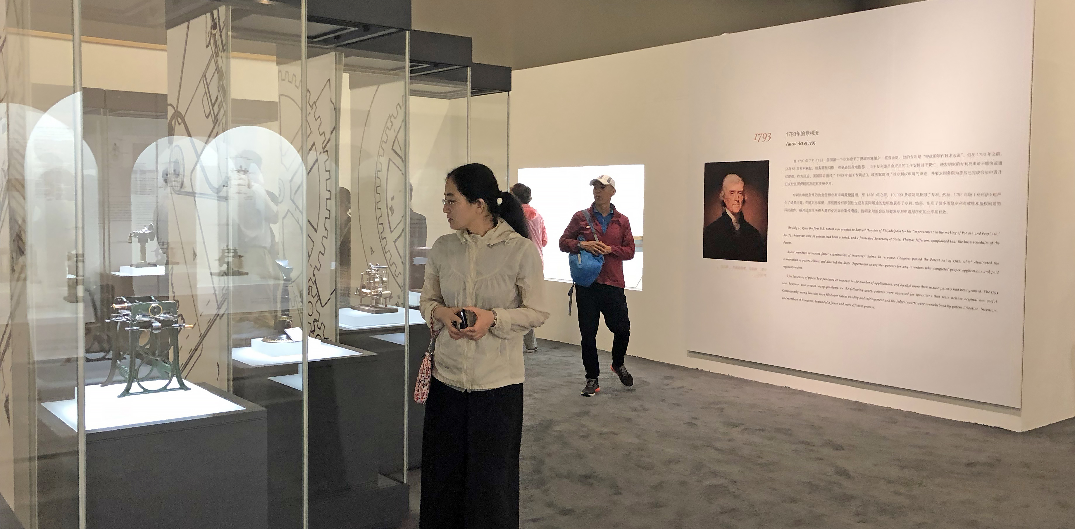 Visitors at the National Museum of China view Hagley's patent models.